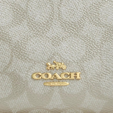 Coach Zip-Top in Signature Canvas – Functional & Chic Everyday Crossbody Bag for Women CW338